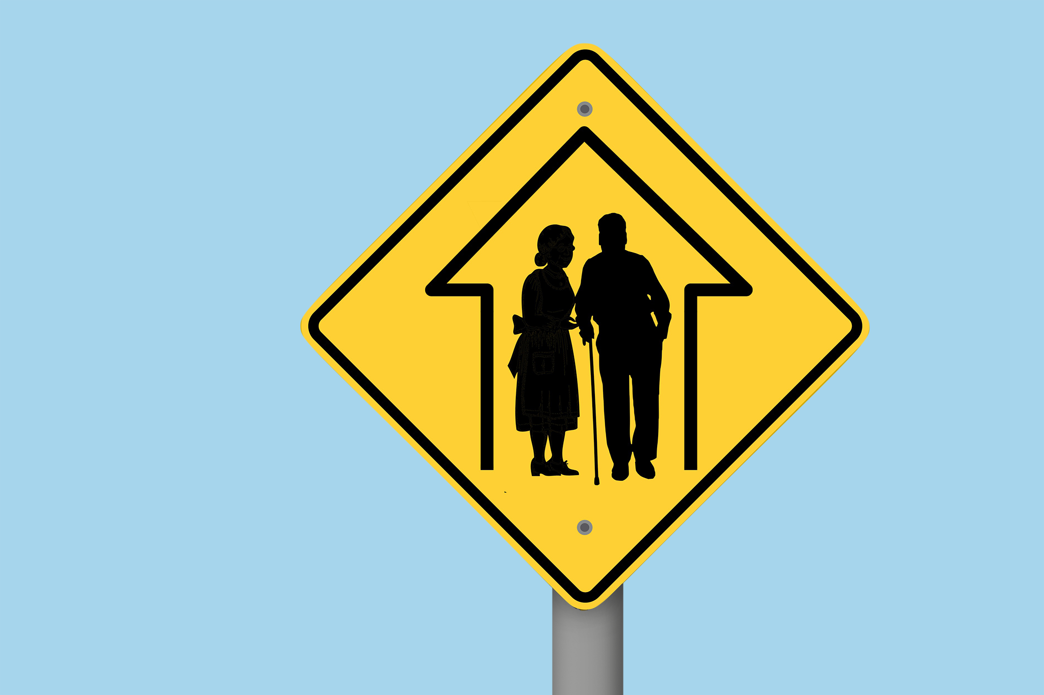 Ein gelbes Verkehrsschild mit der Darstellung zweier älterer Personen als Piktogramm. TU Wien blauer Hintergrund. 